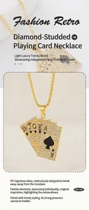 Macro shot of gold poker card pendant featuring royal flush diamonds on box chain