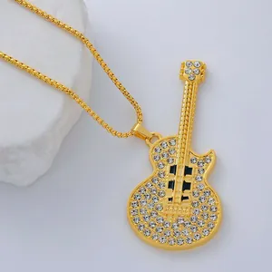 Golden hip hop guitar pendant necklace with white crystals on round box chain