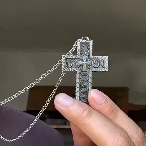 Vintage silver double-layer cross necklace with embossed snake pattern on metal pendant