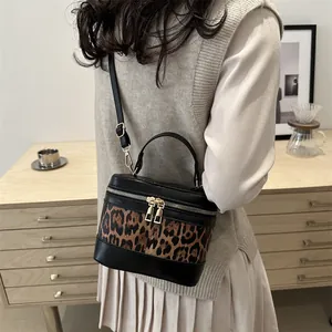Retro leopard print box bag with black leather trim and gold hardware for women