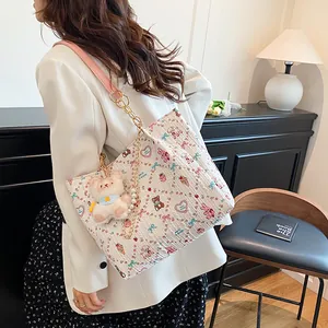 White cartoon tote bag with bunny prints, pearl metal chain and plush bear charm