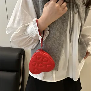 Mini red heart-shaped PU crossbody bag with quilted embroidery and silver hardware