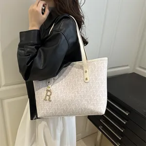Retro letter print tote bag for women with elegant gold R pendant and long top handles