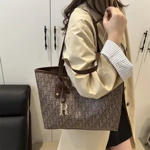 Large capacity vintage tote bag with letter prints and gold R pendant on brown leather