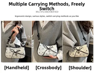 Black and white seersucker bow bag showing tote, crossbody and shoulder carry styles