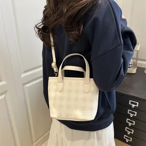 Large plaid tote bag for women with dual top handles and adjustable shoulder strap