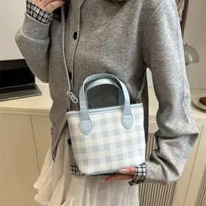 Blue and white gingham checkered tote bag with adjustable shoulder strap for women