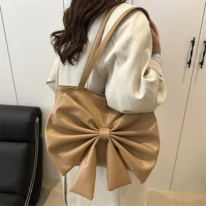 Beige PU leather shoulder bag with large bow decoration for women, autumn fashion tote