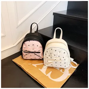 Fashion mini backpacks with pleated fabric and bow detail in pink and white colors