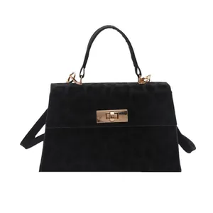 Classic black leopard pattern crossbody bag with golden buckle and top handle