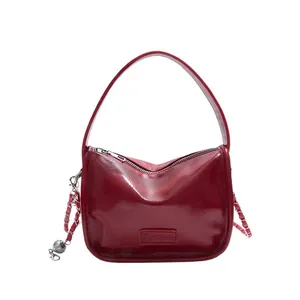Glossy red patent leather handbag with silver chain and wide handle for fashion women