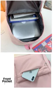 Detailansicht der pinkfarbenen Rucksack-Innenausstattung und vorderen Reißverschlusstasche