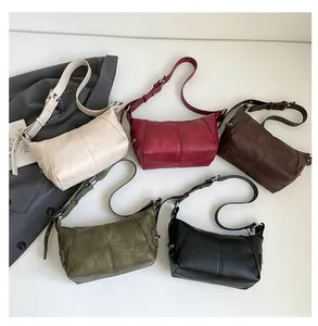 Flat lay of retro PU leather shoulder bags in beige, burgundy, coffee, green, and black
