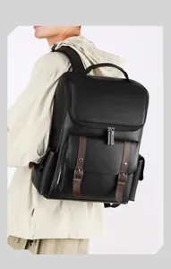 British vintage PU leather backpack with buckle detail and USB charging port on side