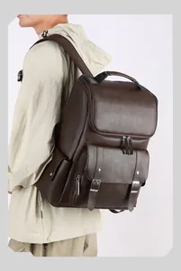 Side view of a vintage dark brown leather backpack showing texture and buckle detail