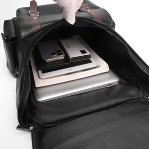Large vintage PU leather backpack with internal compartments for laptops and tablets
