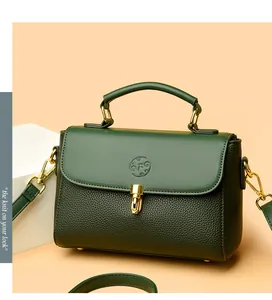 Detail of dark green textured leather bag showing the gold lock and embossed F logo
