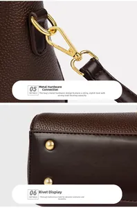 Detail of dark brown pebble leather bag with gold hardware hooks and bottom rivets