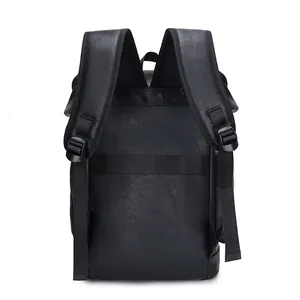 Back view of black leather backpack with luggage strap and wide shoulder straps