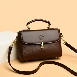 Deep brown leather square handbag with top handle and F letter embossed detail