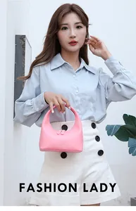 Details der rosa sattelförmigen Handtasche mit Doppelreißverschluss und Rundgriff