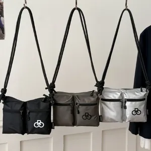 Waterproof nylon crossbody bags for women with dual pockets in black, green, and silver