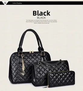 Detailed view of 3-piece quilted handbag set in black leather with gold hardware