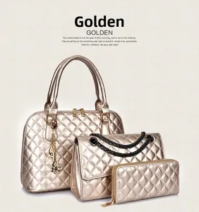 Detailed set of three golden quilted bags including a tote, crossbody, and wallet