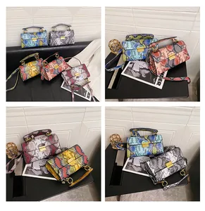 Collage of faux snakeskin crossbody bags featuring gold clasps and multiple colors