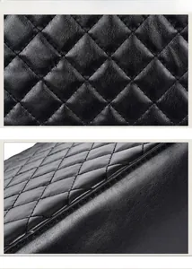 Detail view of premium black quilted leather with elegant diamond stitch pattern
