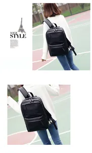 Detail of minimalist black PU leather backpack with hidden front zipper for men