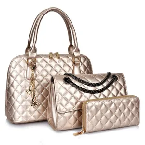 Champagne gold quilted handbag set including shell tote, chain bag, and zip wallet