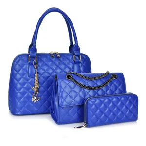 Three-piece set of blue quilted leather bags including tote, chain bag, and wallet
