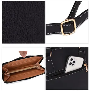 Detail of black pebbled leather texture, white stitching, and golden hardware on the handbag