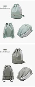 Detailansicht der Fitness-Tasche mit Trocken-Nass-Trennung und Schuhfach in Grün und Grau