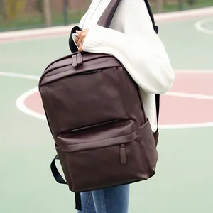 Fashionable dark brown PU leather backpack for men with a vintage minimalist design