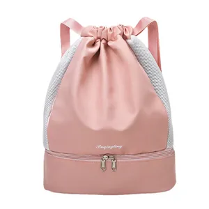 Pink drawstring gym bag with shoe compartment and dry-wet separation for sports