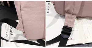 Detalle de mochila rosa con costuras reforzadas y correa de nailon ajustable negra