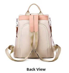 Detail view of the embroidered backpack's back with anti-theft zipper pockets