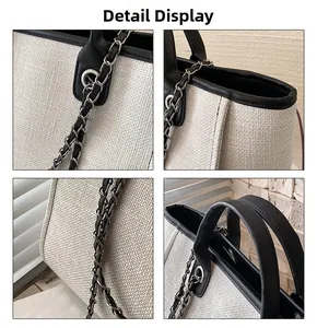 Detalle del bolso tote de tejido beige con correas de cuero y herrajes plateados