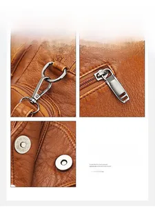 Detail of silver metallic hardware and smooth zippers on a brown leather crossbody bag