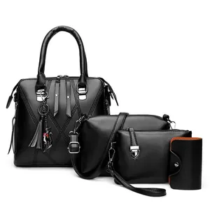 Black 4-piece set of quilted faux leather handbags with cat tassel and silver hardware