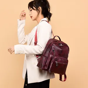 Chic burgundy leather backpack for women, stylish large capacity travel school bag