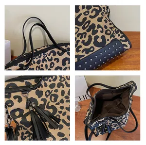 Détails du sac cabas imprimé léopard avec rivets métalliques et pompon en cuir chic