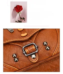 Close-up of vintage camel brown leather bag featuring lychee texture and metal buckle detail