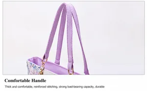 Detail of light purple floral handbag showing stitched leather strap and golden hardware