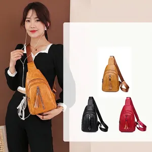 Borsa a tracolla retrò in pelle PU da donna con dettaglio nappe e tracolla larga