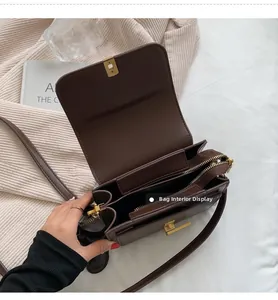 Vue intérieure détaillée de ce sac bandoulière marron minimaliste avec fermeture éclair