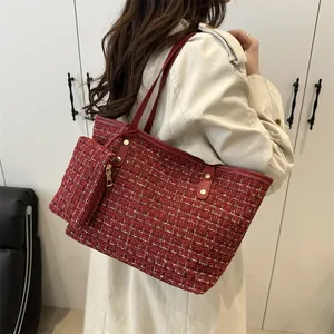 Red tweed tote bag with matching pouch and gold studs for stylish daily commuting