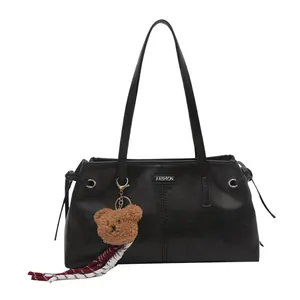 Fashionable black faux leather tote bag for women with teddy bear charm and silk scarf